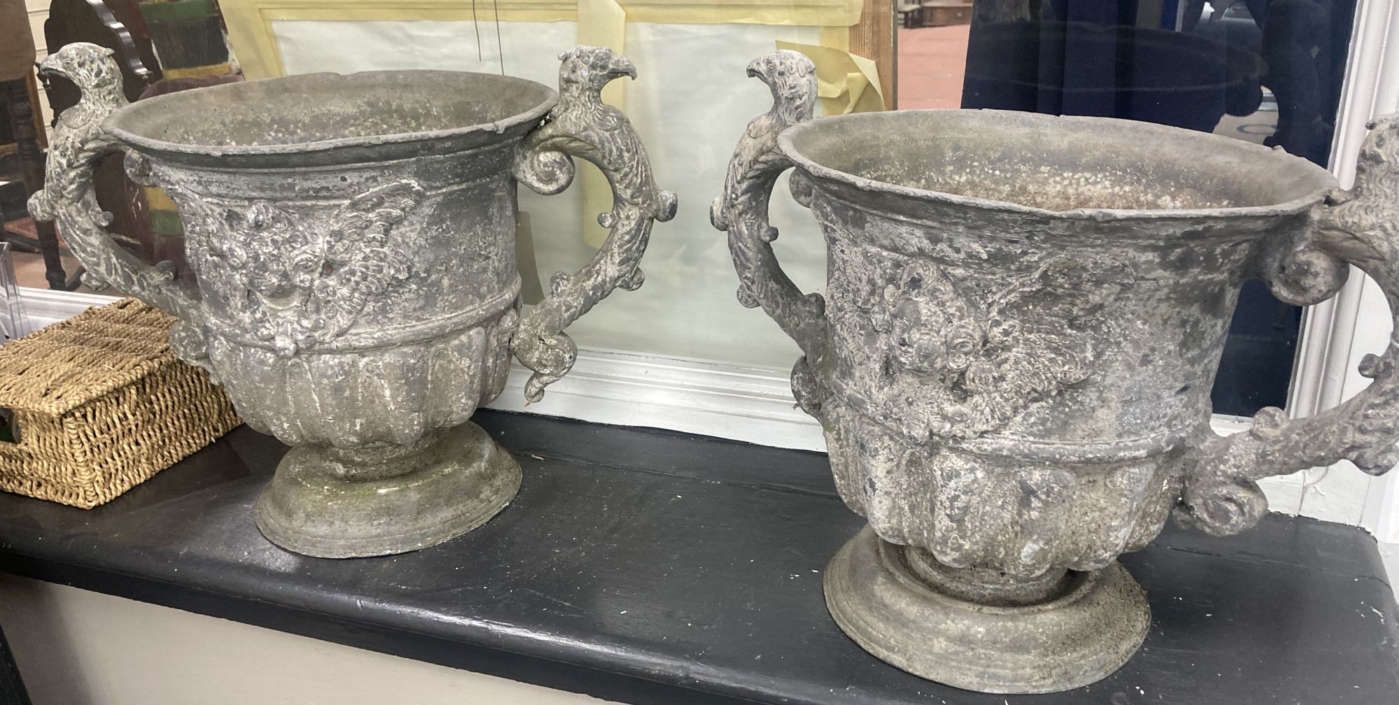 A pair of 19th century cast lead two handled garden planters, width 54cm, height 39cm